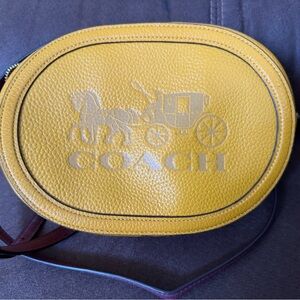 Coach Yellow Pebbled Leather Oval Crossbody with Logo